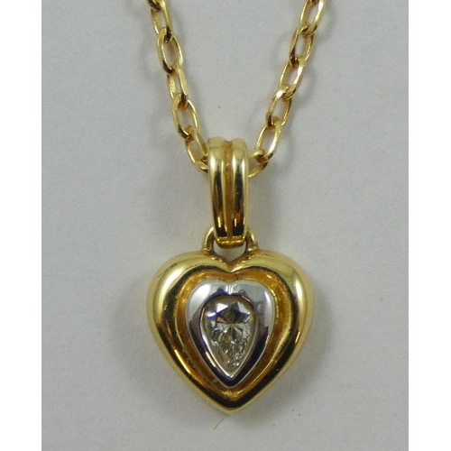 68 - An 18ct gold and diamond pendant, collet set with a pear shape stone, 9ct gold chain.