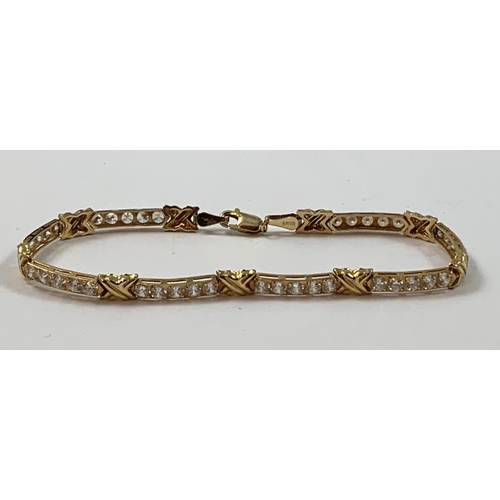 70 - A 9ct gold panel link bracelet, set with cubic zirconia stones, length 19 cm, weight 6.5 gms.