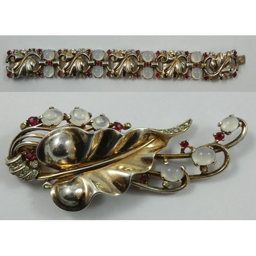 71 - Alfred Philippe for Trifari - a sterling silver gilt moonstone and red and white paste bracelet and ... 