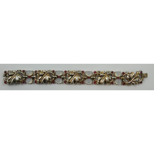 71 - Alfred Philippe for Trifari - a sterling silver gilt moonstone and red and white paste bracelet and ... 