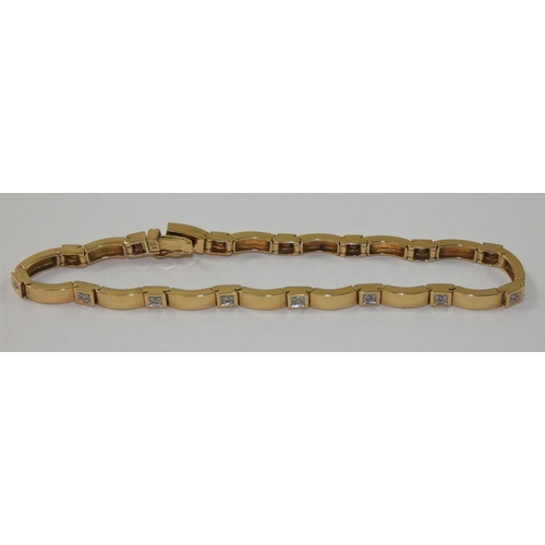 82 - A 9ct gold diamond set bracelet, set with brilliant cut stones, length 19 cm, weight 9 gms.