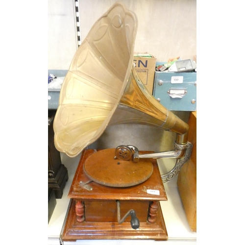 189 - A reproduction mahogany cased wind-up gramophone ‘His Masters Voice’, with pictorial Nippy to the so... 