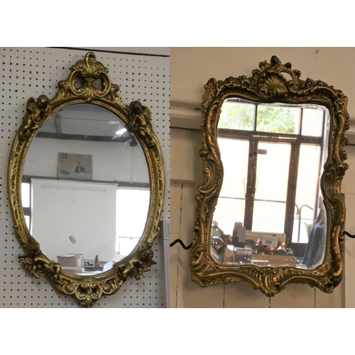 230 - An oval gilt framed mirror with chrubs, 72x46cm and another, 58x38cm (2)