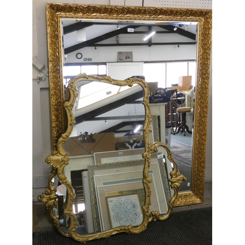 231 - A large gilt framed rectangular bevel edged mirror, 105x135cm and two with shaped borders (3)