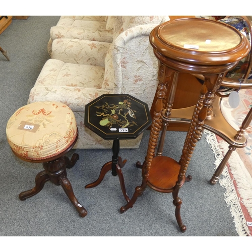 236 - A mahogany circular plant stand with under tier on barley twist supports, together with an ebonised ... 