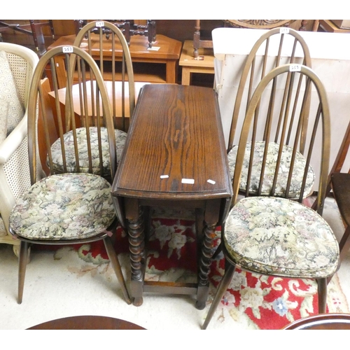 253 - An oak drop leaf gate leg table with barley twist supports and a set of Ercol dining chairs (5)