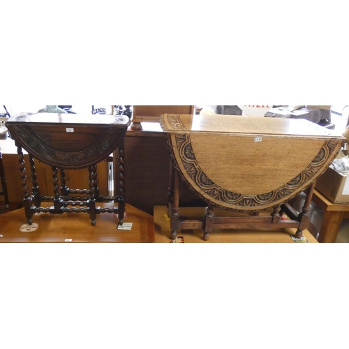 268 - Two oak drop leaf tables with carved tops (2)