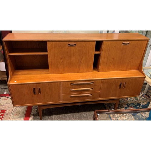 288 - A G-Plan teak fresco sideboard, circa 1960's, the upper section with drop down drinks cupboard to th... 