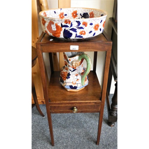 263 - A mahogany washstand with matching jug and bowl set (not original)