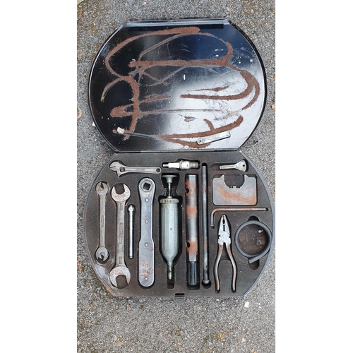 110 - A Jaguar Mk II tool kit, in metal case, lacking one spanner and Girling tin.