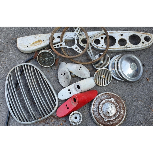 117 - Various MGA trim, including grills, dashboard, glass and other items.