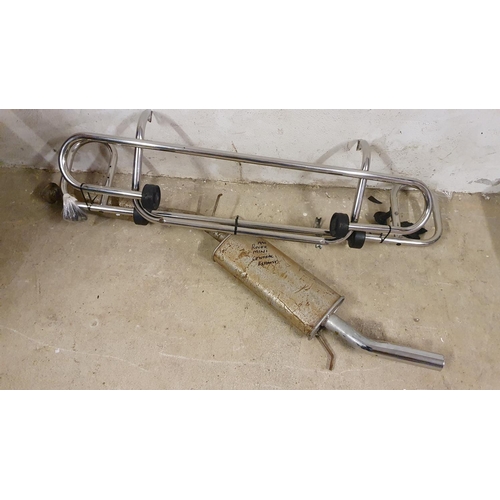 119 - A 1990 Rover Mini part exhaust and a chrome front and rear nudge bar set.