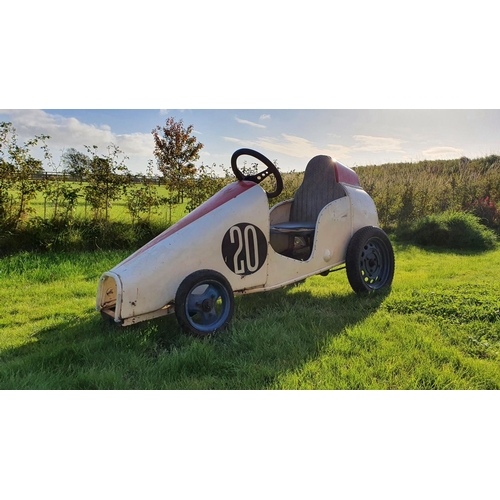 101 - A scratch built pedal car, c 1960/70's, constructed from shaped tube and angle iron, using J40 runni... 