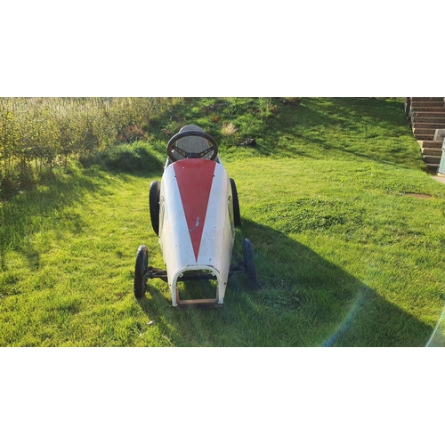 101 - A scratch built pedal car, c 1960/70's, constructed from shaped tube and angle iron, using J40 runni... 