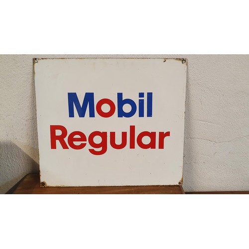 28 - A single sided plastic Dunlop tyre sign, 121 x 30 cm and a single sided tin Mobil Regular sign, 30 x... 