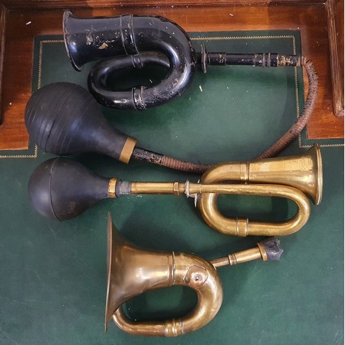 78 - A Rotax black vintage horn and two other horns (3).