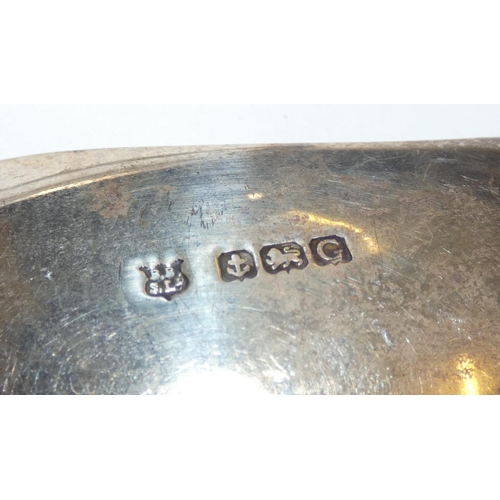 140 - A silver Old English pattern serving spoon, Sheffield 1916 and another serving spoon, Birmingham 193... 