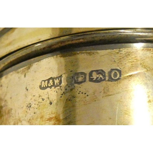 141 - Of tobacco interest; a silver tobacco jar, by Mappin & Webb, Sheffield 1931, the twist off cover ins... 