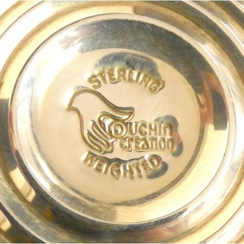 146 - A sterling silver pair of desk candlesticks, loaded, an Edwardian silver trinket box, Birmingham 190... 