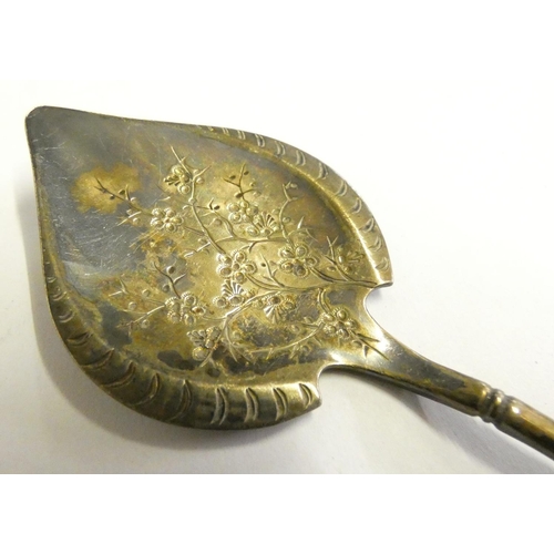 151 - A Victorian silver pair of sugar tongs, Exeter 1847, a set of six silver handled tea knives, London ... 