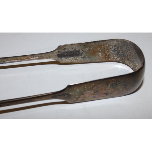 151 - A Victorian silver pair of sugar tongs, Exeter 1847, a set of six silver handled tea knives, London ... 