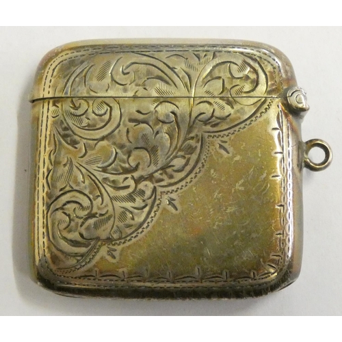 152 - A Victorian silver pair of salt pots, Birmingham 1894, with glass liners and spoons, a silver vesta ... 