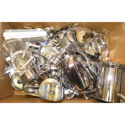 161 - A quantity of plated wares to include a bottle holder with gadrooned border.