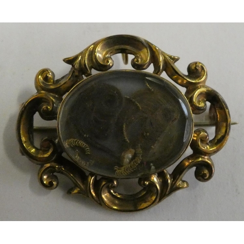 177 - A Victorian gold and hair memorial brooch, repaired, case