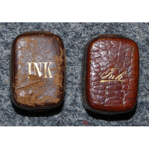 182 - Four 19th Century papier mache snuff boxes, two leather clad travelling inkwells and another box.