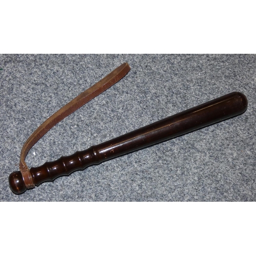 183 - A Victorian wooden truncheon, with gilt 883 number, leather strap, 38 cm.