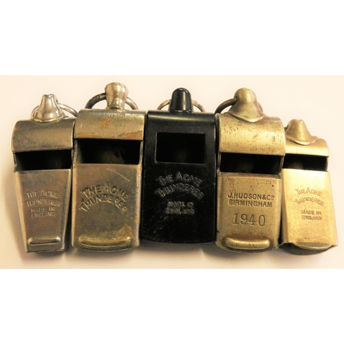 184 - A electroplated bosun's whistle with broad arrow stamp, a J. Hudson & Co. whistle stamped 1940 and f... 
