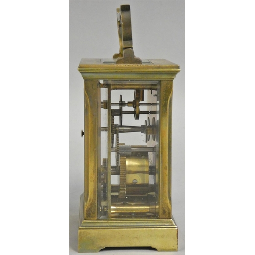 416 - A brass carriage timepiece, retailed by Reid & Sons Ltd., Newcastle on Tyne, white enamel dial with ... 