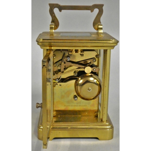 417 - Richard & Cie, a French brass striking carriage clock, the white enamel dial with Roman numerals, th... 