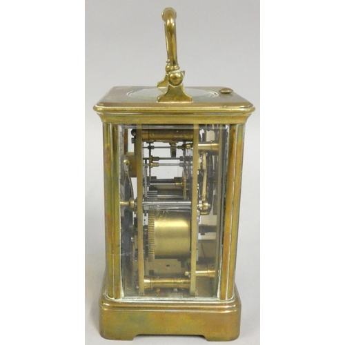 420 - A French brass striking carriage clock, the white enamel dial with Roman numerals and retailer signe... 