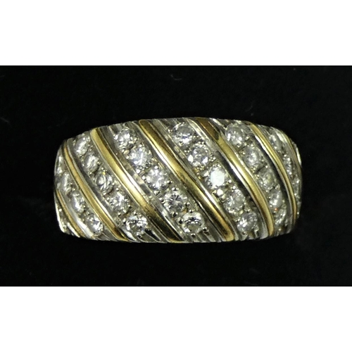 88 - A gold and diamond dress ring, set with six rows of brilliant cut stones, approximately 0.75cts tota... 