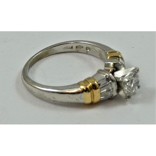 95 - A platinum and diamond single stone ring, claw set with a brilliant cut stone, estimated to weigh 0.... 