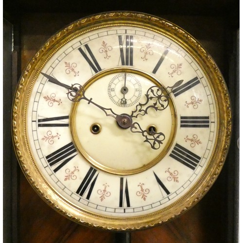 424 - A Vienna style walnut wall clock, the two part dial with subsidiary seconds dial, the movement signe... 