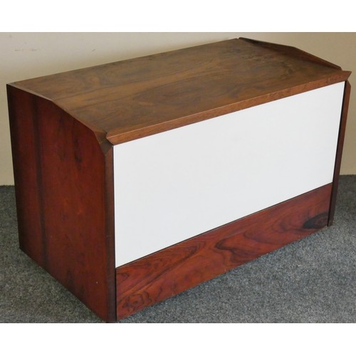 498 - White & Newton Ltd., of Portsmouth, a mid century rosewood and white melamine cocktail cabinet, the ... 