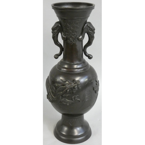 364 - A late 19th century Chinese bronze vase, of baluster form with applied dragon chasing the sacred pea... 