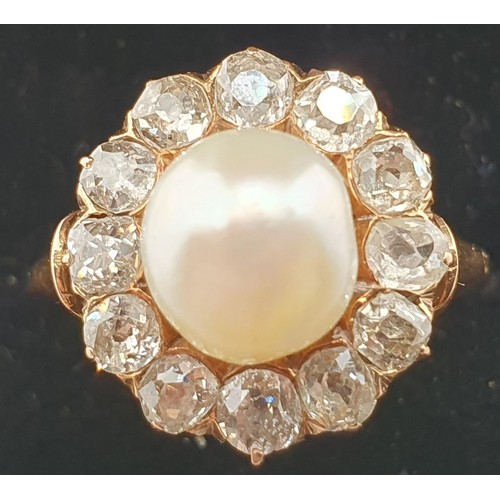 101 - A Victorian natural pearl and diamond cluster ring, the peg set natural saltwater bead, measuring 7.... 