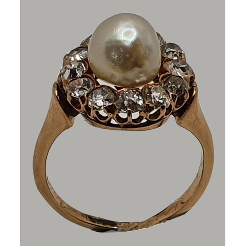 101 - A Victorian natural pearl and diamond cluster ring, the peg set natural saltwater bead, measuring 7.... 