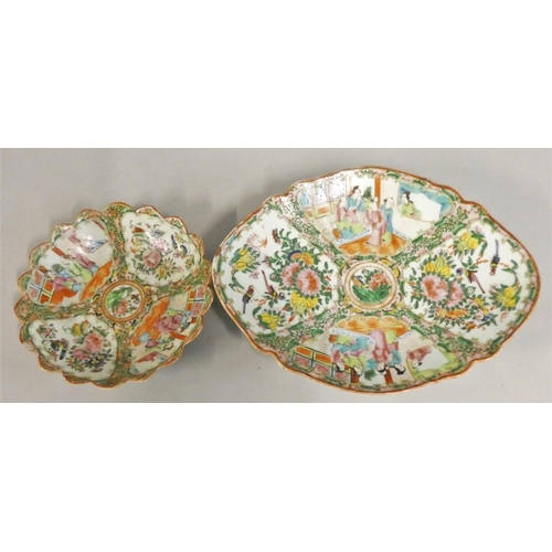 365 - A Chinese famile verte oval shaped dish, with figures and bird decoration, raised on a pedestal base... 