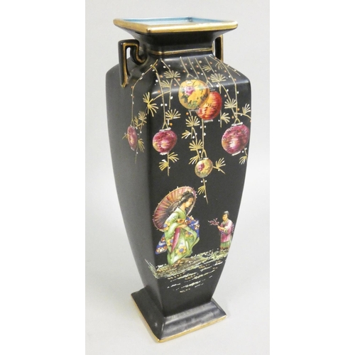 335 - A Staffordshire Japanese style vase, decorated with figures beneath lanterns on matt black ground wi... 