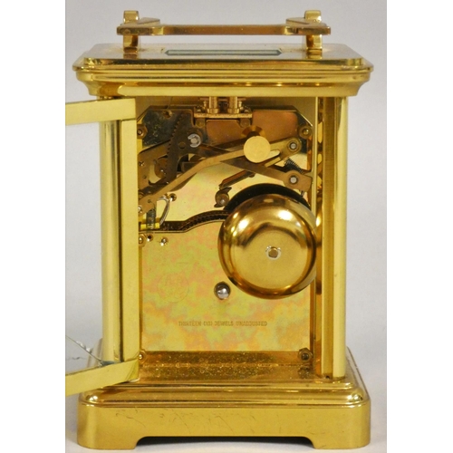 421 - Richard & Cie, a French brass striking carriage clock, the white enamel dial with Roman numerals, th... 