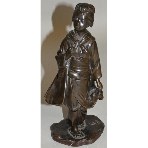 356 - A Japanese Meiji period bronze okimono of a lady carrying a vessel, signed to the base, 25 cm.