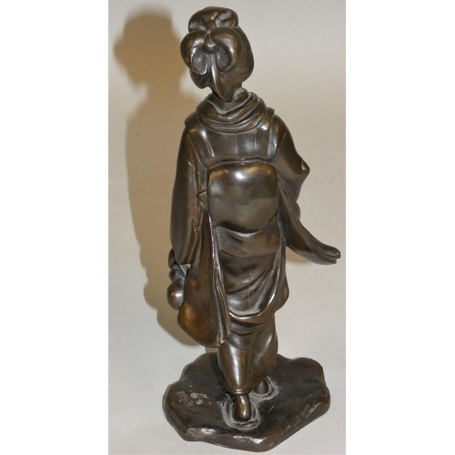 356 - A Japanese Meiji period bronze okimono of a lady carrying a vessel, signed to the base, 25 cm.