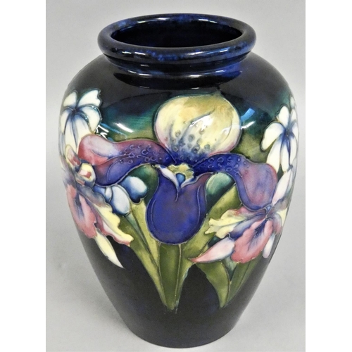 346 - A Moorcroft Iris pattern inverted baluster shoulder vase, typically tube lined with flowerheads and ... 