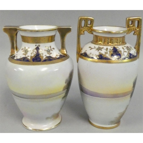 357 - A pair of Japanese Noritaki baluster vases, decorated with swans on a lake, gilt handles, 20 cm.