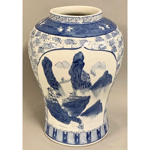 371 - A Chinese blue and white baluster vase, decorated with a mountain landscape panel and another with s... 