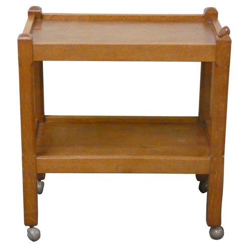 505 - Rabbitman: A Peter Heap (Wetwang) English oak tea trolley, adzed, two tiers, chamfered legs, on shep... 